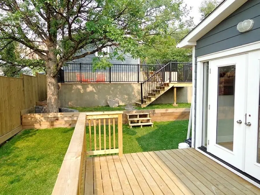Back yard with a new deck and seating area