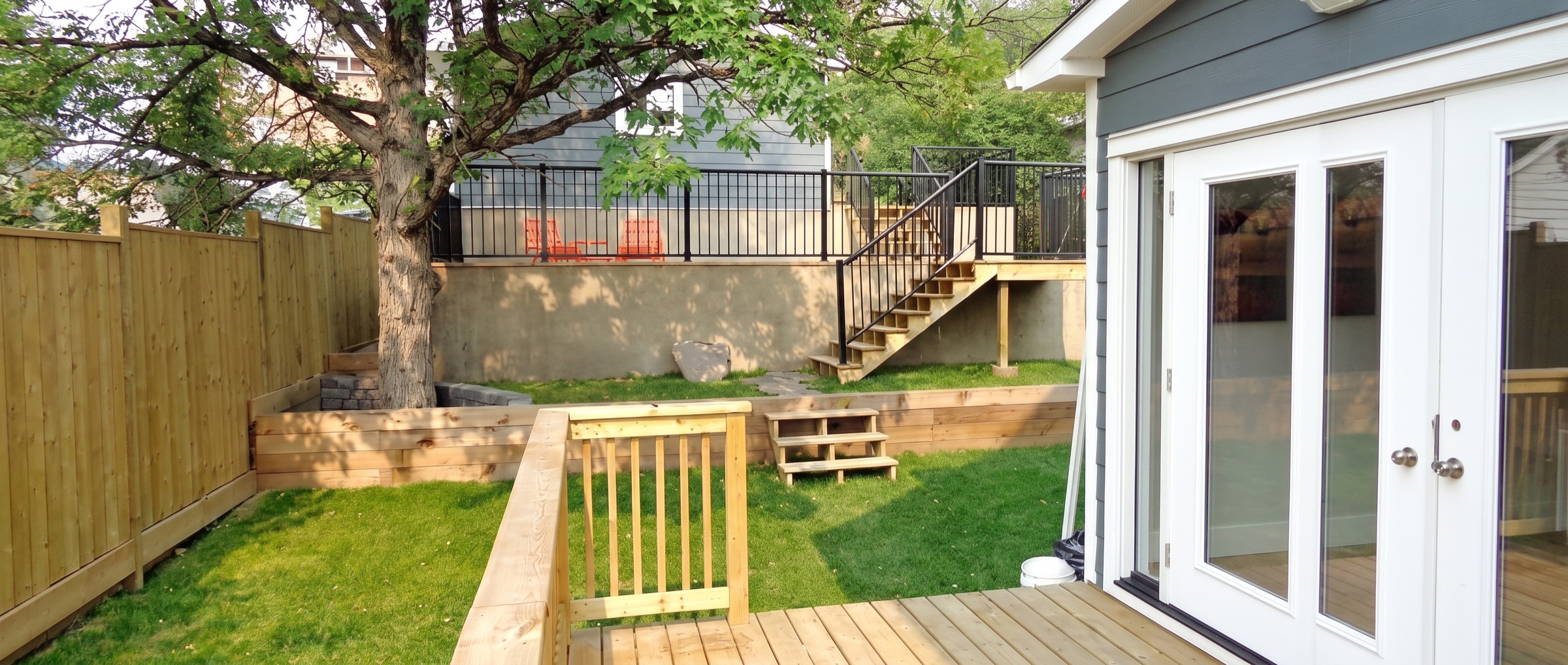 Detached garage with a backyard suite above